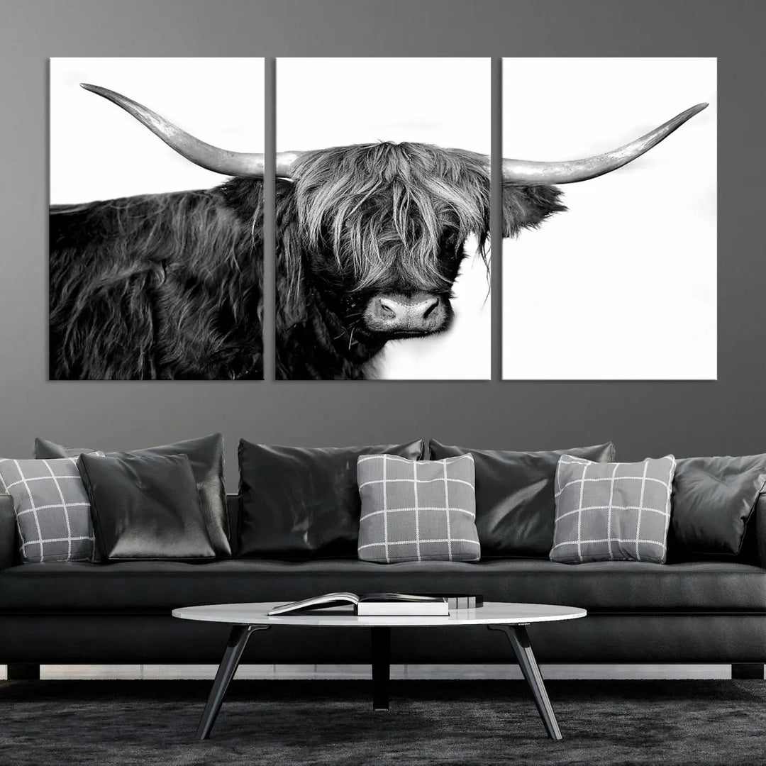 A Black and White Highland Cow Multi Panel Wall Art Canvas Print with UV-protective coating is displayed.