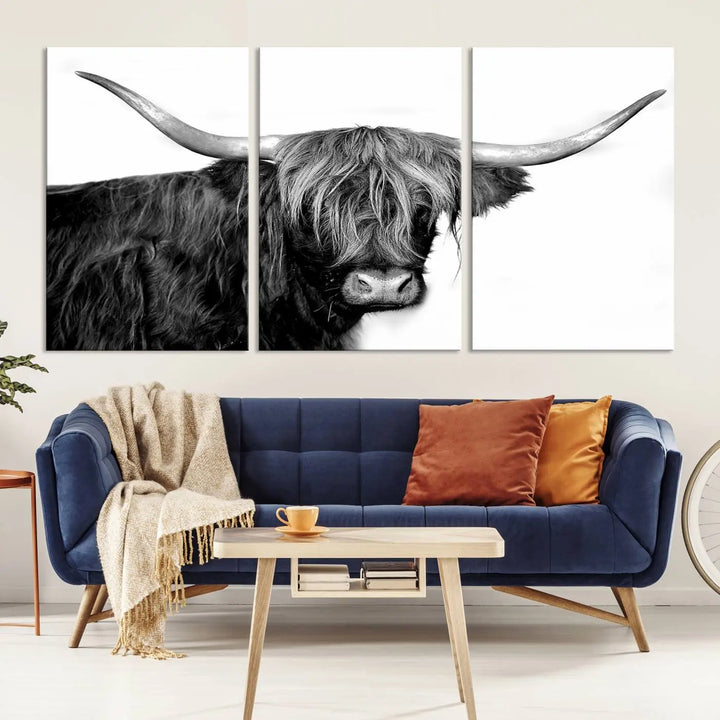 A Black and White Highland Cow Multi Panel Wall Art Canvas Print with UV-protective coating is displayed.