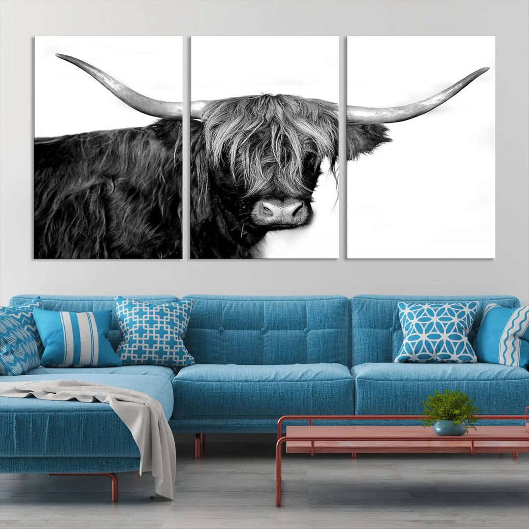 A Black and White Highland Cow Multi Panel Wall Art Canvas Print with UV-protective coating is displayed.