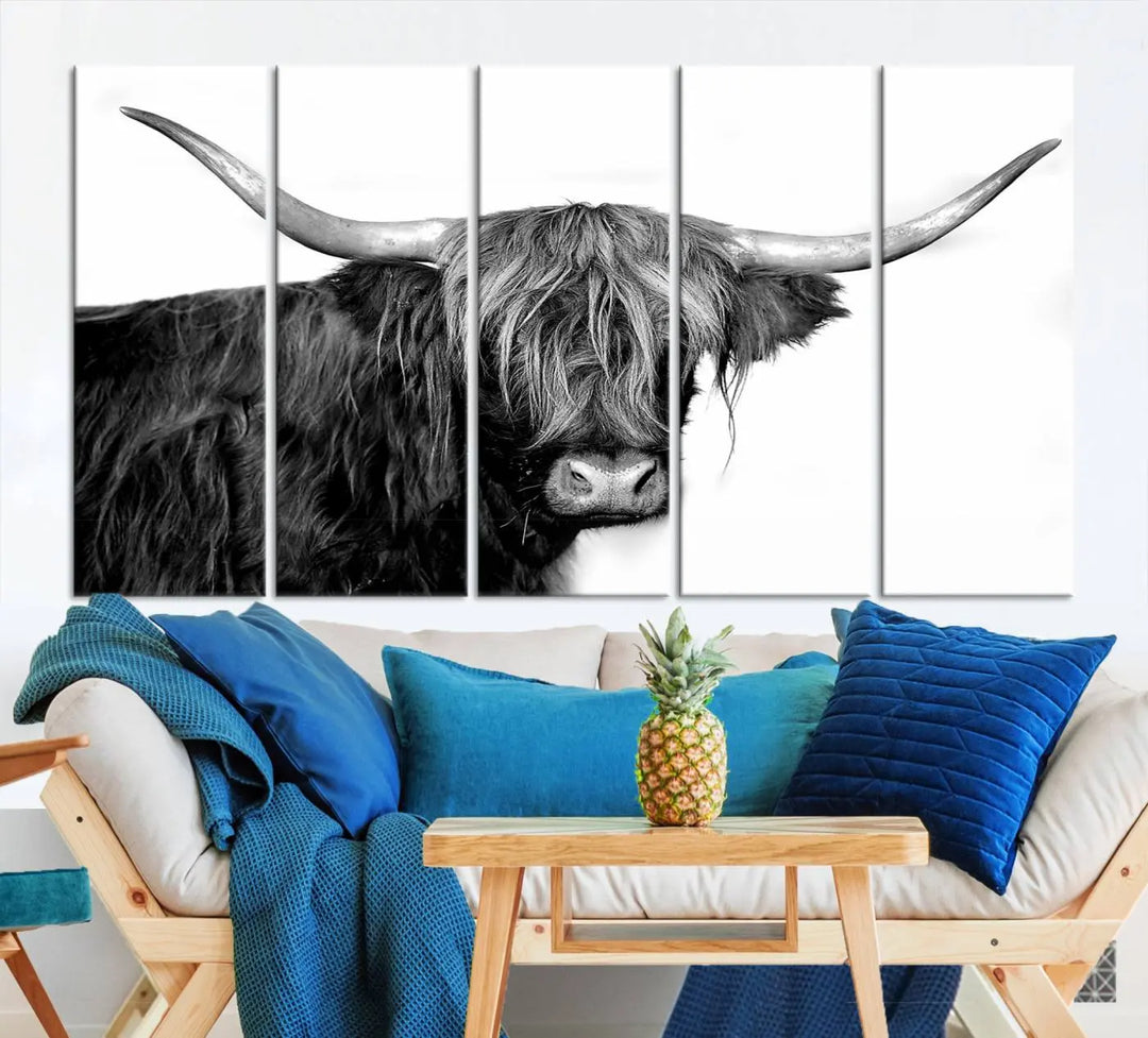 A Black and White Highland Cow Multi Panel Wall Art Canvas Print with UV-protective coating is displayed.