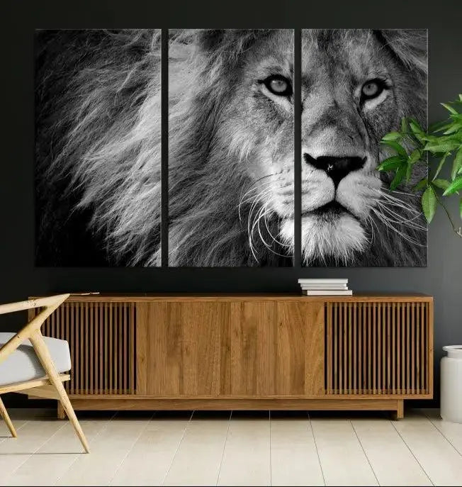 The Black and White Lion Canvas Wall Art Print, a hand-assembled triptych featuring the majestic face of a lion, hangs above. These stunning canvas prints come with free shipping.