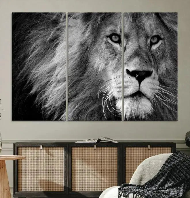 The Black and White Lion Canvas Wall Art Print, a hand-assembled triptych featuring the majestic face of a lion, hangs above. These stunning canvas prints come with free shipping.