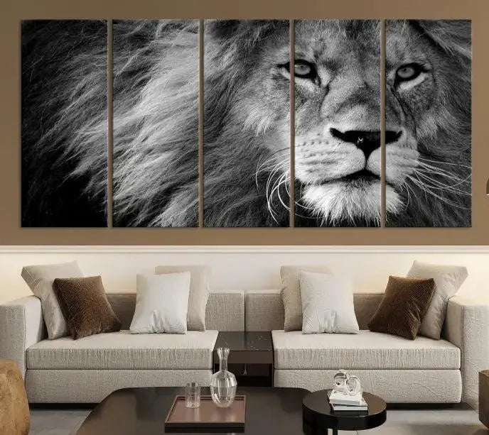 The Black and White Lion Canvas Wall Art Print, a hand-assembled triptych featuring the majestic face of a lion, hangs above. These stunning canvas prints come with free shipping.