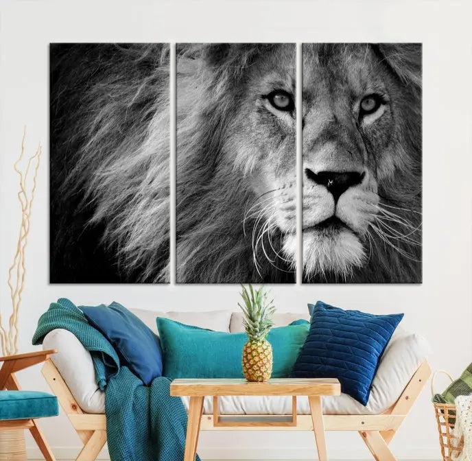 The Black and White Lion Canvas Wall Art Print, a hand-assembled triptych featuring the majestic face of a lion, hangs above. These stunning canvas prints come with free shipping.