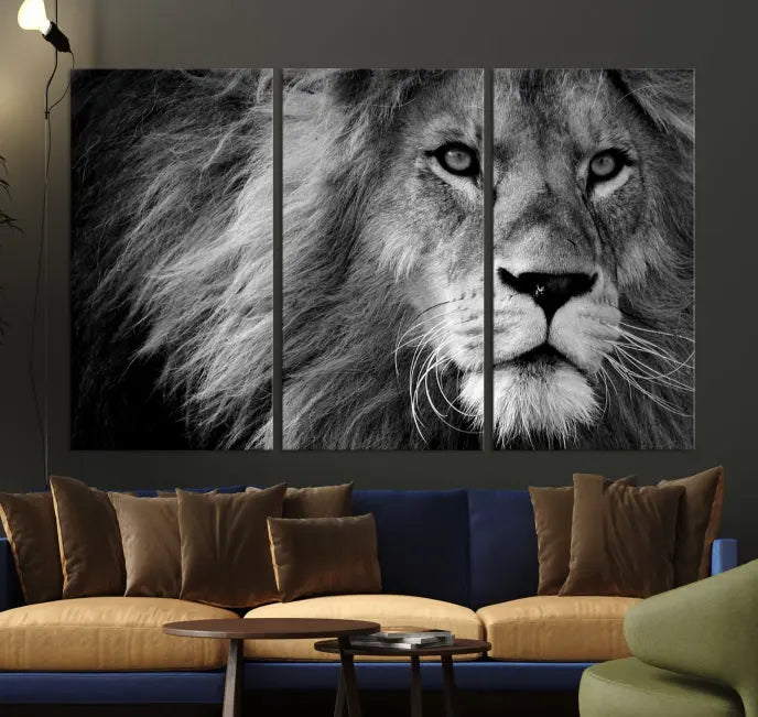 The Black and White Lion Canvas Wall Art Print, a hand-assembled triptych featuring the majestic face of a lion, hangs above. These stunning canvas prints come with free shipping.