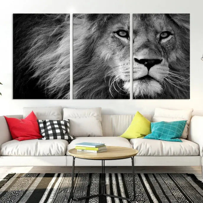 The Black and White Lion Canvas Wall Art Print, a hand-assembled triptych featuring the majestic face of a lion, hangs above. These stunning canvas prints come with free shipping.