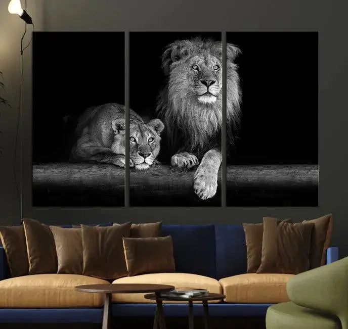 A triptych of the Black and White Lion Couple Wall Art Canvas Print hangs elegantly, showcasing museum-quality, hand-assembled framed art pieces. Enjoy free shipping on this stunning artwork.