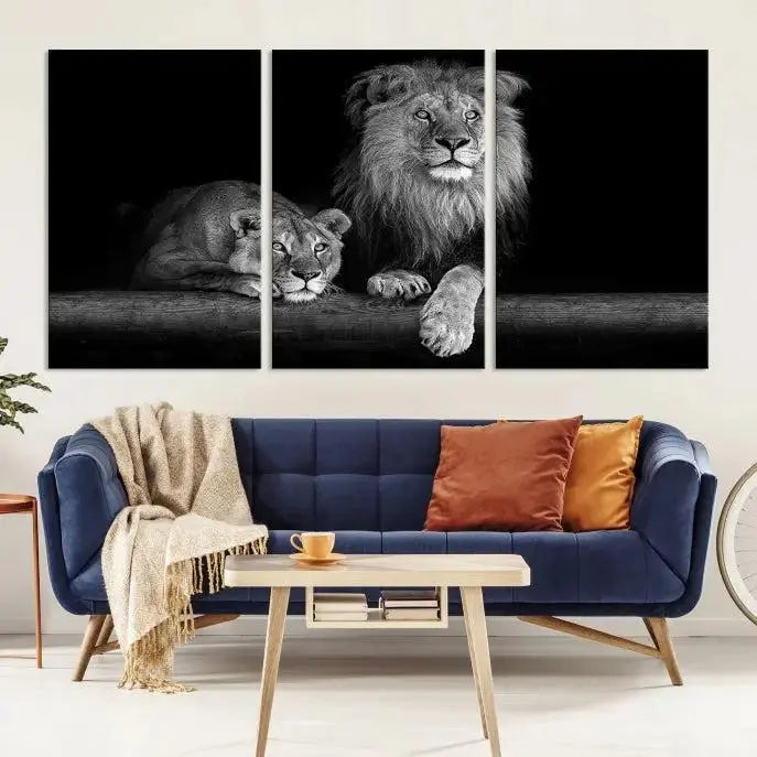 A triptych of the Black and White Lion Couple Wall Art Canvas Print hangs elegantly, showcasing museum-quality, hand-assembled framed art pieces. Enjoy free shipping on this stunning artwork.