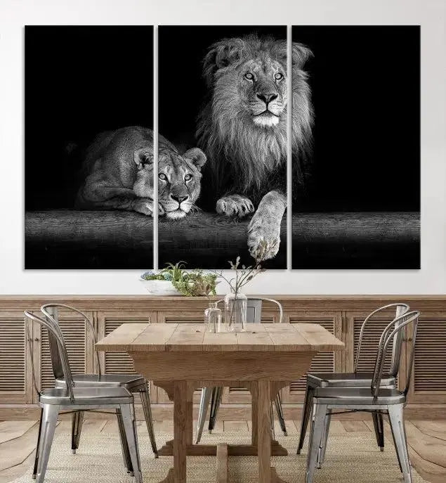 A triptych of the Black and White Lion Couple Wall Art Canvas Print hangs elegantly, showcasing museum-quality, hand-assembled framed art pieces. Enjoy free shipping on this stunning artwork.