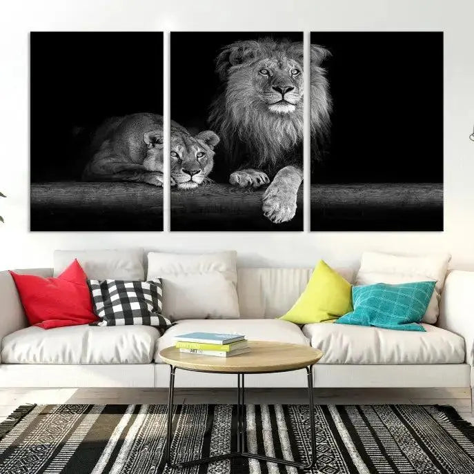 A triptych of the Black and White Lion Couple Wall Art Canvas Print hangs elegantly, showcasing museum-quality, hand-assembled framed art pieces. Enjoy free shipping on this stunning artwork.