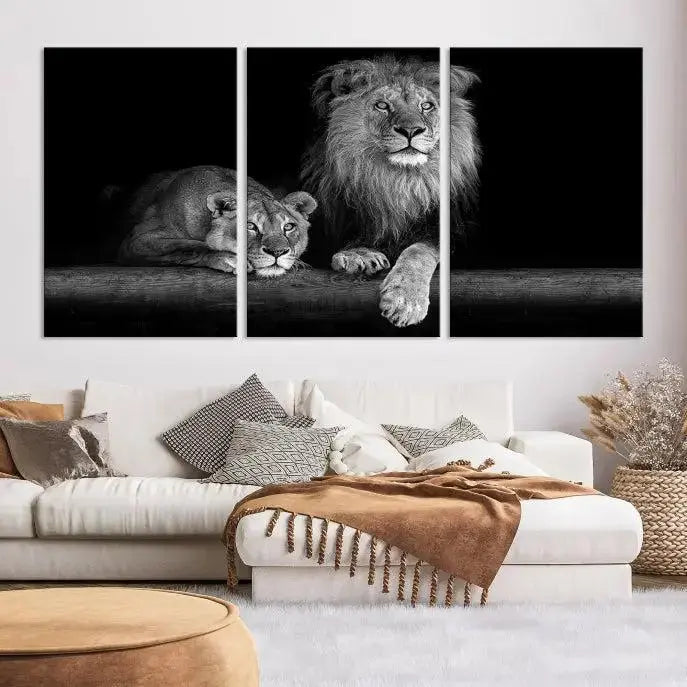 A triptych of the Black and White Lion Couple Wall Art Canvas Print hangs elegantly, showcasing museum-quality, hand-assembled framed art pieces. Enjoy free shipping on this stunning artwork.