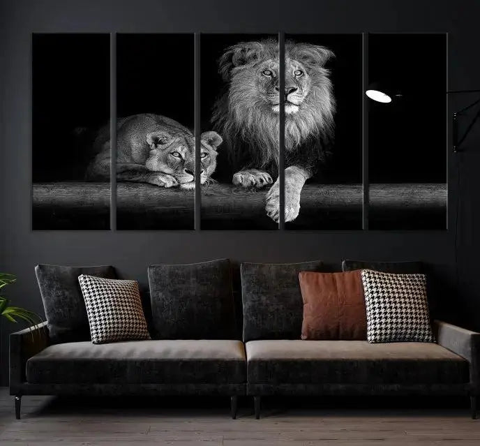 A triptych of the Black and White Lion Couple Wall Art Canvas Print hangs elegantly, showcasing museum-quality, hand-assembled framed art pieces. Enjoy free shipping on this stunning artwork.