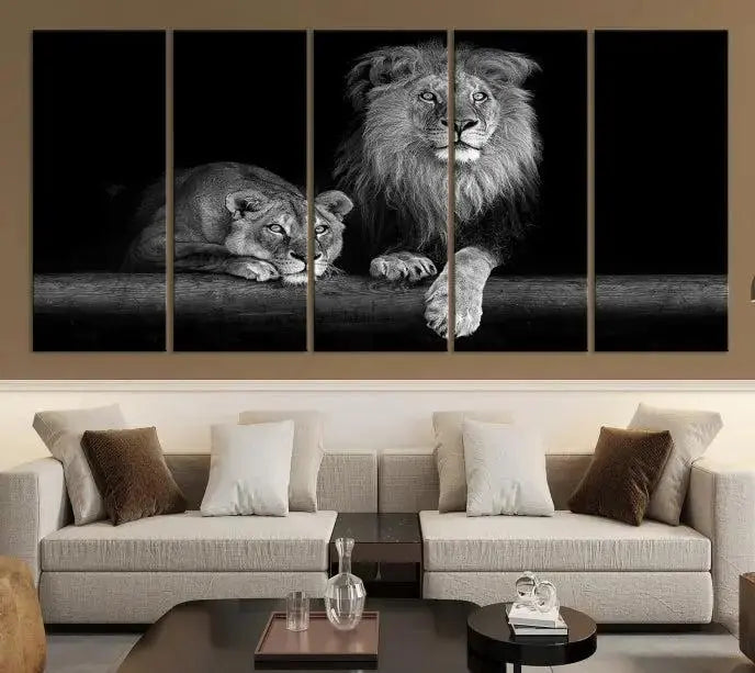 A triptych of the Black and White Lion Couple Wall Art Canvas Print hangs elegantly, showcasing museum-quality, hand-assembled framed art pieces. Enjoy free shipping on this stunning artwork.