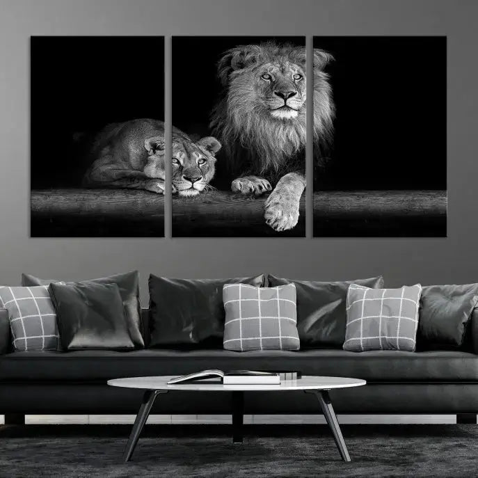 A triptych of the Black and White Lion Couple Wall Art Canvas Print hangs elegantly, showcasing museum-quality, hand-assembled framed art pieces. Enjoy free shipping on this stunning artwork.