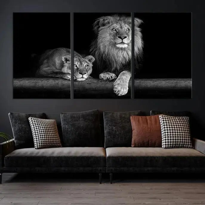 A triptych of the Black and White Lion Couple Wall Art Canvas Print hangs elegantly, showcasing museum-quality, hand-assembled framed art pieces. Enjoy free shipping on this stunning artwork.