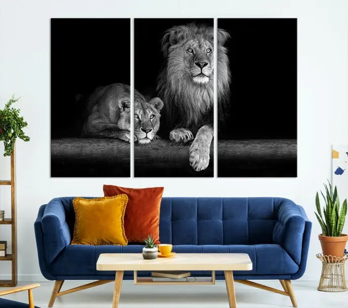 A triptych of the Black and White Lion Couple Wall Art Canvas Print hangs elegantly, showcasing museum-quality, hand-assembled framed art pieces. Enjoy free shipping on this stunning artwork.