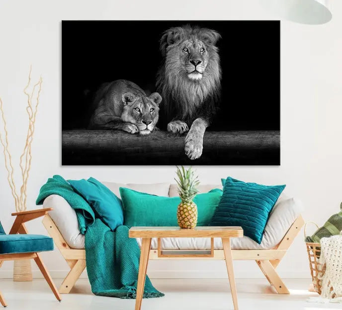 A triptych of the Black and White Lion Couple Wall Art Canvas Print hangs elegantly, showcasing museum-quality, hand-assembled framed art pieces. Enjoy free shipping on this stunning artwork.