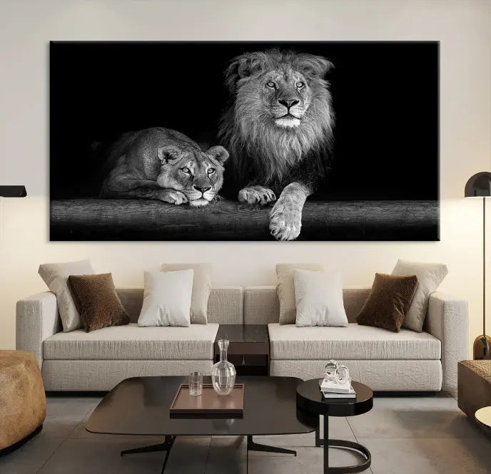 A triptych of the Black and White Lion Couple Wall Art Canvas Print hangs elegantly, showcasing museum-quality, hand-assembled framed art pieces. Enjoy free shipping on this stunning artwork.