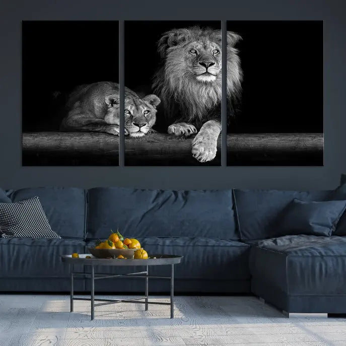 A triptych of the Black and White Lion Couple Wall Art Canvas Print hangs elegantly, showcasing museum-quality, hand-assembled framed art pieces. Enjoy free shipping on this stunning artwork.