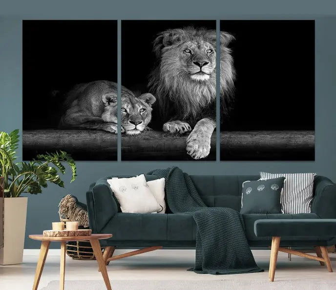 A triptych of the Black and White Lion Couple Wall Art Canvas Print hangs elegantly, showcasing museum-quality, hand-assembled framed art pieces. Enjoy free shipping on this stunning artwork.