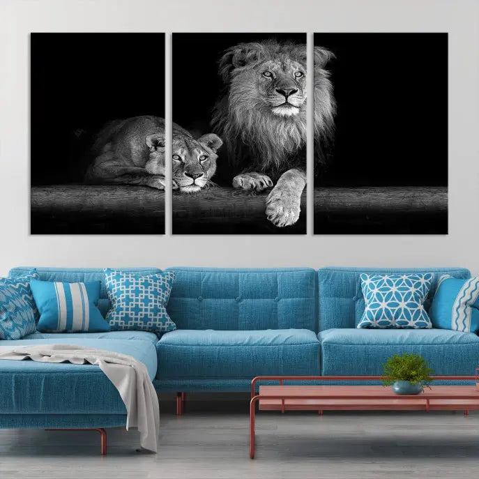 A triptych of the Black and White Lion Couple Wall Art Canvas Print hangs elegantly, showcasing museum-quality, hand-assembled framed art pieces. Enjoy free shipping on this stunning artwork.