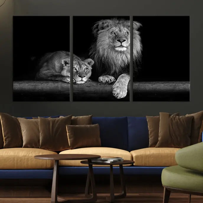 A triptych of the Black and White Lion Couple Wall Art Canvas Print hangs elegantly, showcasing museum-quality, hand-assembled framed art pieces. Enjoy free shipping on this stunning artwork.