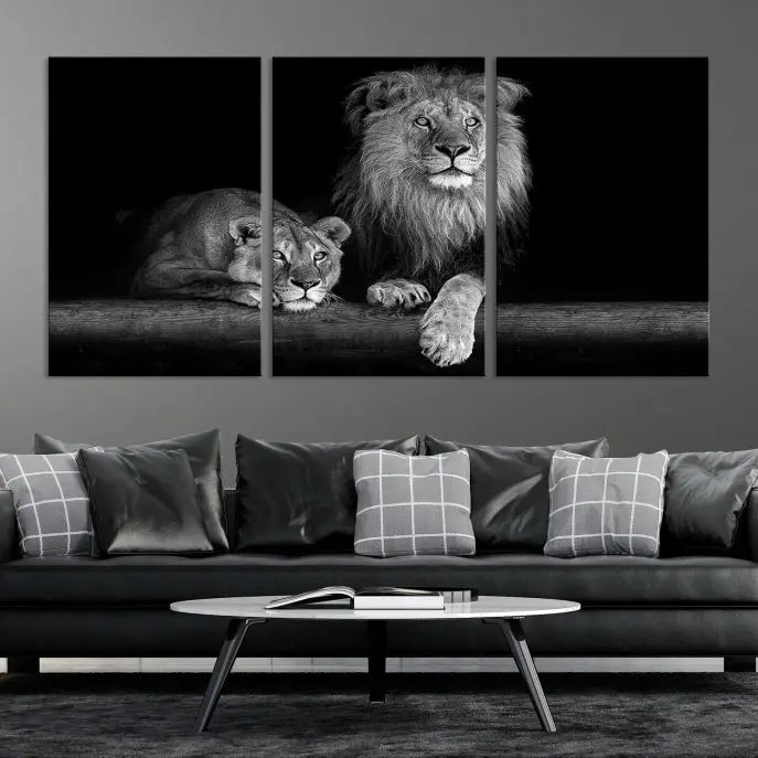 A triptych of the Black and White Lion Couple Wall Art Canvas Print hangs elegantly, showcasing museum-quality, hand-assembled framed art pieces. Enjoy free shipping on this stunning artwork.