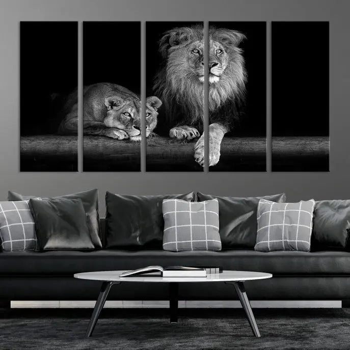 A triptych of the Black and White Lion Couple Wall Art Canvas Print hangs elegantly, showcasing museum-quality, hand-assembled framed art pieces. Enjoy free shipping on this stunning artwork.