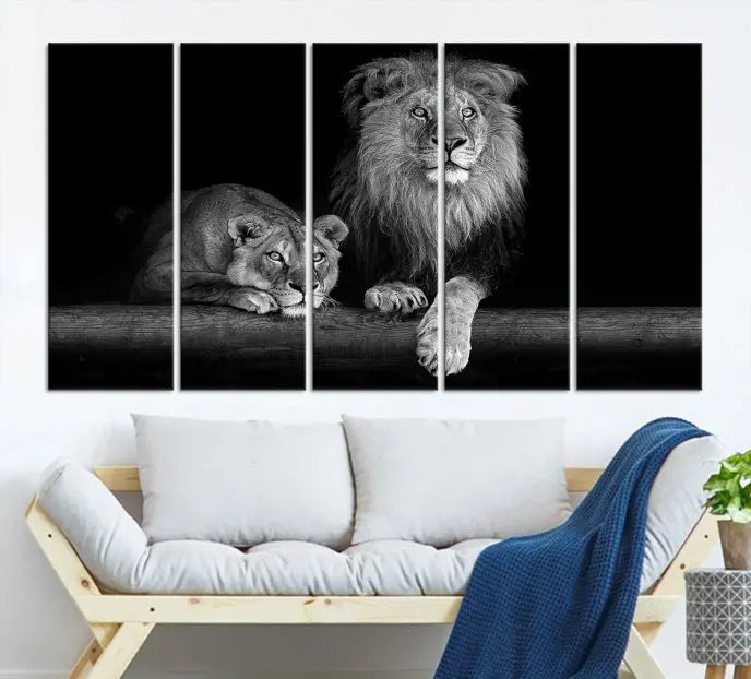 A triptych of the Black and White Lion Couple Wall Art Canvas Print hangs elegantly, showcasing museum-quality, hand-assembled framed art pieces. Enjoy free shipping on this stunning artwork.