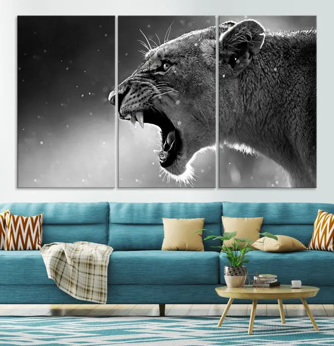 A stunning centerpiece for the living room, the Black and White Lioness Wall Art Canvas Print graces the wall.