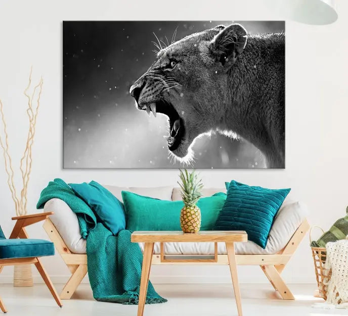 A stunning centerpiece for the living room, the Black and White Lioness Wall Art Canvas Print graces the wall.