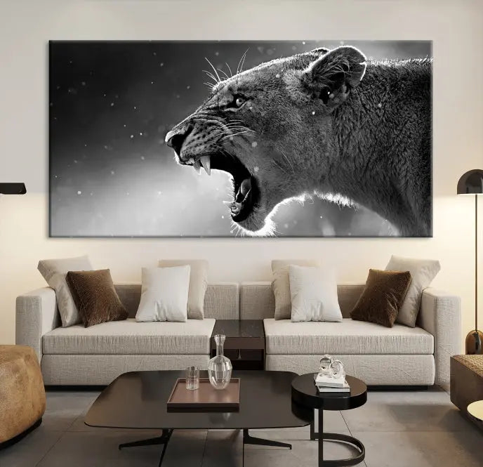 A stunning centerpiece for the living room, the Black and White Lioness Wall Art Canvas Print graces the wall.