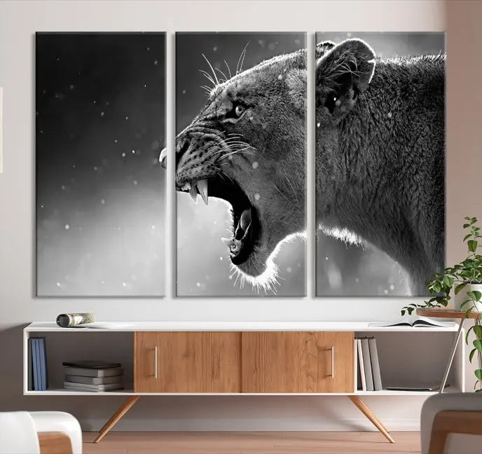 A stunning centerpiece for the living room, the Black and White Lioness Wall Art Canvas Print graces the wall.