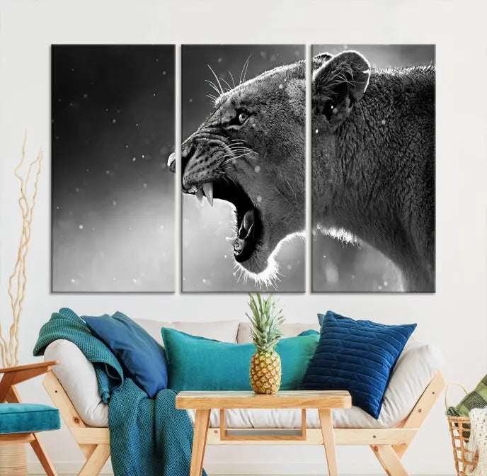 A stunning centerpiece for the living room, the Black and White Lioness Wall Art Canvas Print graces the wall.