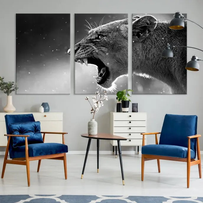 A stunning centerpiece for the living room, the Black and White Lioness Wall Art Canvas Print graces the wall.