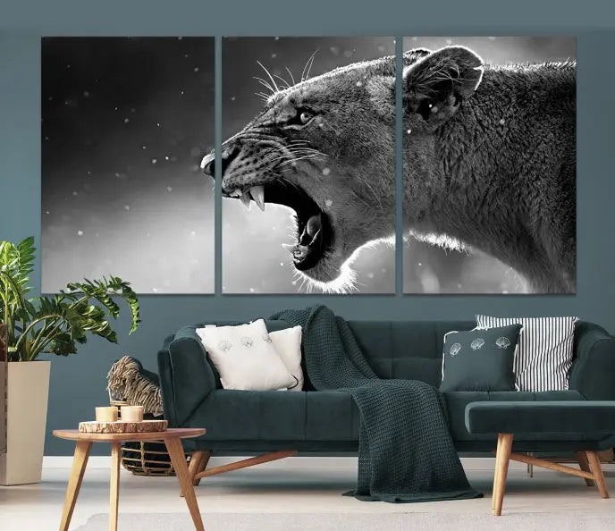 A stunning centerpiece for the living room, the Black and White Lioness Wall Art Canvas Print graces the wall.