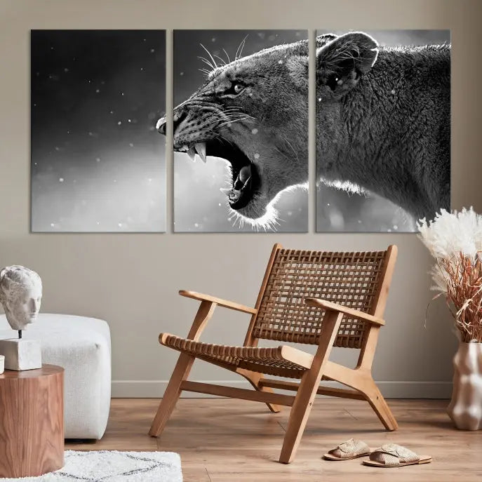 A stunning centerpiece for the living room, the Black and White Lioness Wall Art Canvas Print graces the wall.