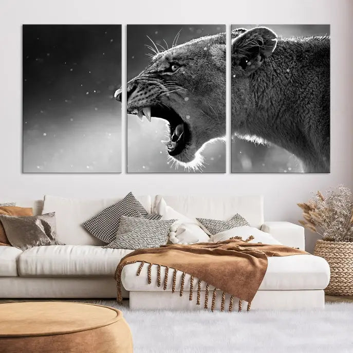 A stunning centerpiece for the living room, the Black and White Lioness Wall Art Canvas Print graces the wall.