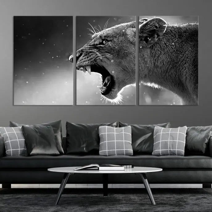 A stunning centerpiece for the living room, the Black and White Lioness Wall Art Canvas Print graces the wall.