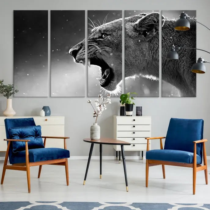 A stunning centerpiece for the living room, the Black and White Lioness Wall Art Canvas Print graces the wall.