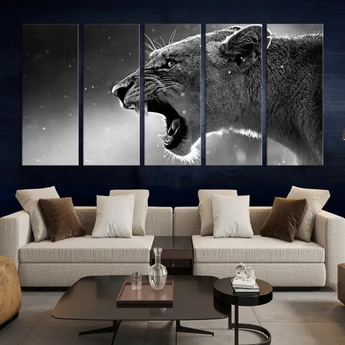 A stunning centerpiece for the living room, the Black and White Lioness Wall Art Canvas Print graces the wall.