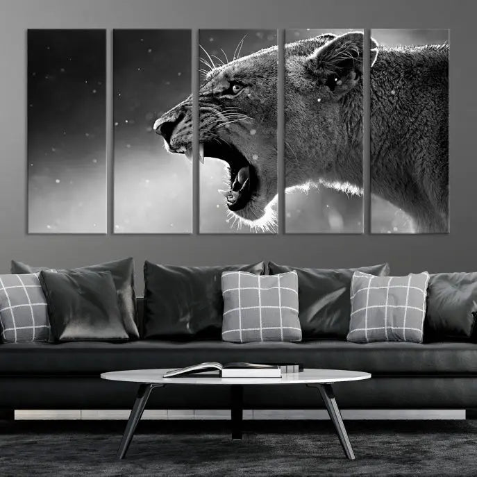 A stunning centerpiece for the living room, the Black and White Lioness Wall Art Canvas Print graces the wall.