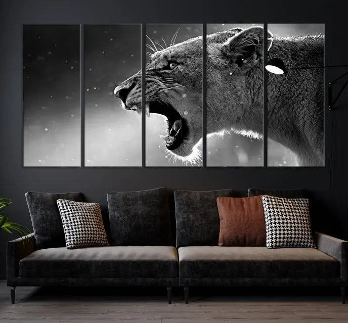 A stunning centerpiece for the living room, the Black and White Lioness Wall Art Canvas Print graces the wall.