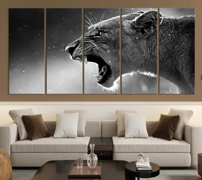 A stunning centerpiece for the living room, the Black and White Lioness Wall Art Canvas Print graces the wall.