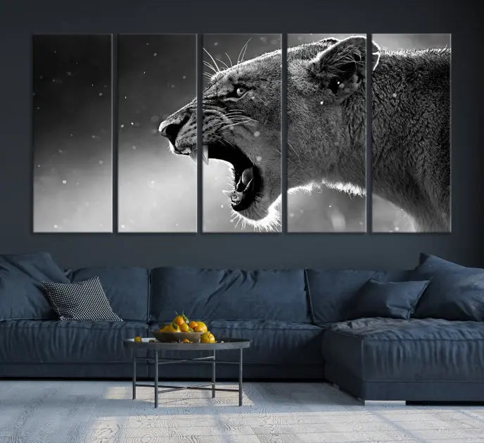 A stunning centerpiece for the living room, the Black and White Lioness Wall Art Canvas Print graces the wall.