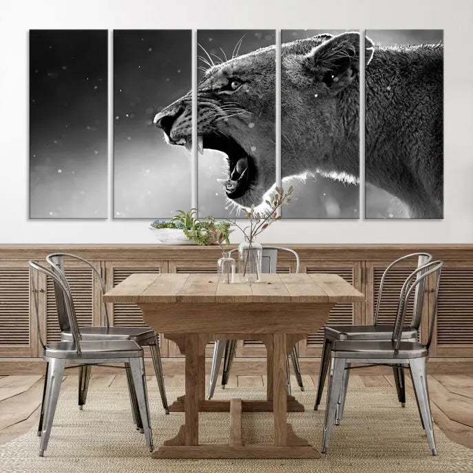 A stunning centerpiece for the living room, the Black and White Lioness Wall Art Canvas Print graces the wall.