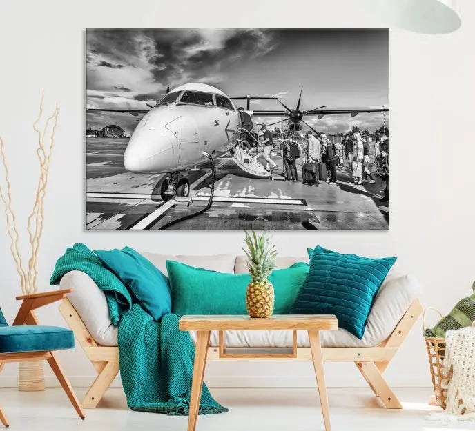 Introducing the Black and White Narrow Body Aircraft Wall Art Canvas Print: This striking three-panel canvas features a timeless black-and-white depiction of people boarding a propeller airplane. Printed on museum-quality canvas, each piece is UV-protected to maintain its vibrancy. These prints are ready to hang, making it easy to display them with ease.