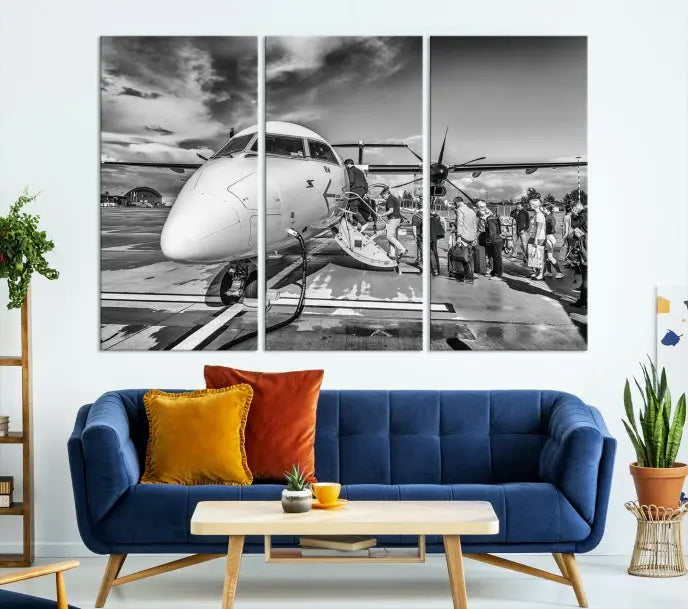 Introducing the Black and White Narrow Body Aircraft Wall Art Canvas Print: This striking three-panel canvas features a timeless black-and-white depiction of people boarding a propeller airplane. Printed on museum-quality canvas, each piece is UV-protected to maintain its vibrancy. These prints are ready to hang, making it easy to display them with ease.