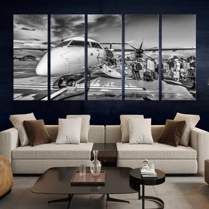 Introducing the Black and White Narrow Body Aircraft Wall Art Canvas Print: This striking three-panel canvas features a timeless black-and-white depiction of people boarding a propeller airplane. Printed on museum-quality canvas, each piece is UV-protected to maintain its vibrancy. These prints are ready to hang, making it easy to display them with ease.