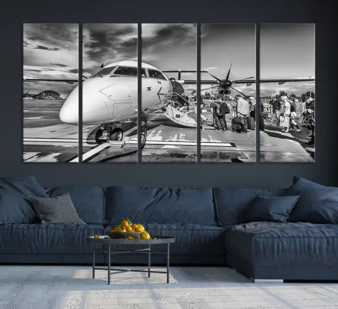 Introducing the Black and White Narrow Body Aircraft Wall Art Canvas Print: This striking three-panel canvas features a timeless black-and-white depiction of people boarding a propeller airplane. Printed on museum-quality canvas, each piece is UV-protected to maintain its vibrancy. These prints are ready to hang, making it easy to display them with ease.